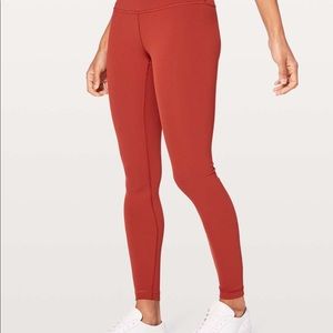 Lululemon burnt Orange wunder under HR, size 6